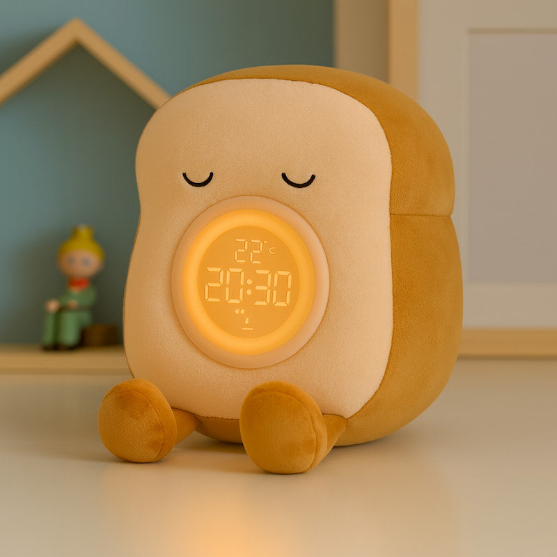 peluche toast réveil avec téléphone posé sur les pieds