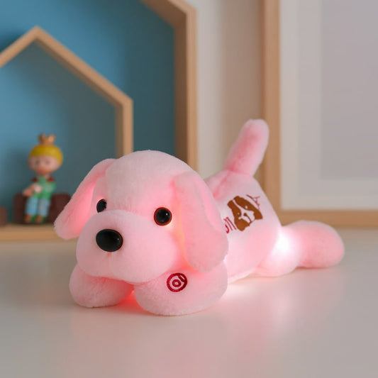 chien en plush lumineux sur table de nuit