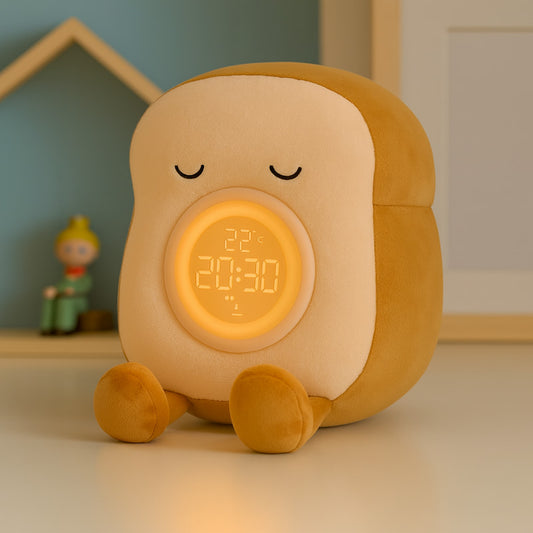 peluche toast réveil avec téléphone posé sur les pieds